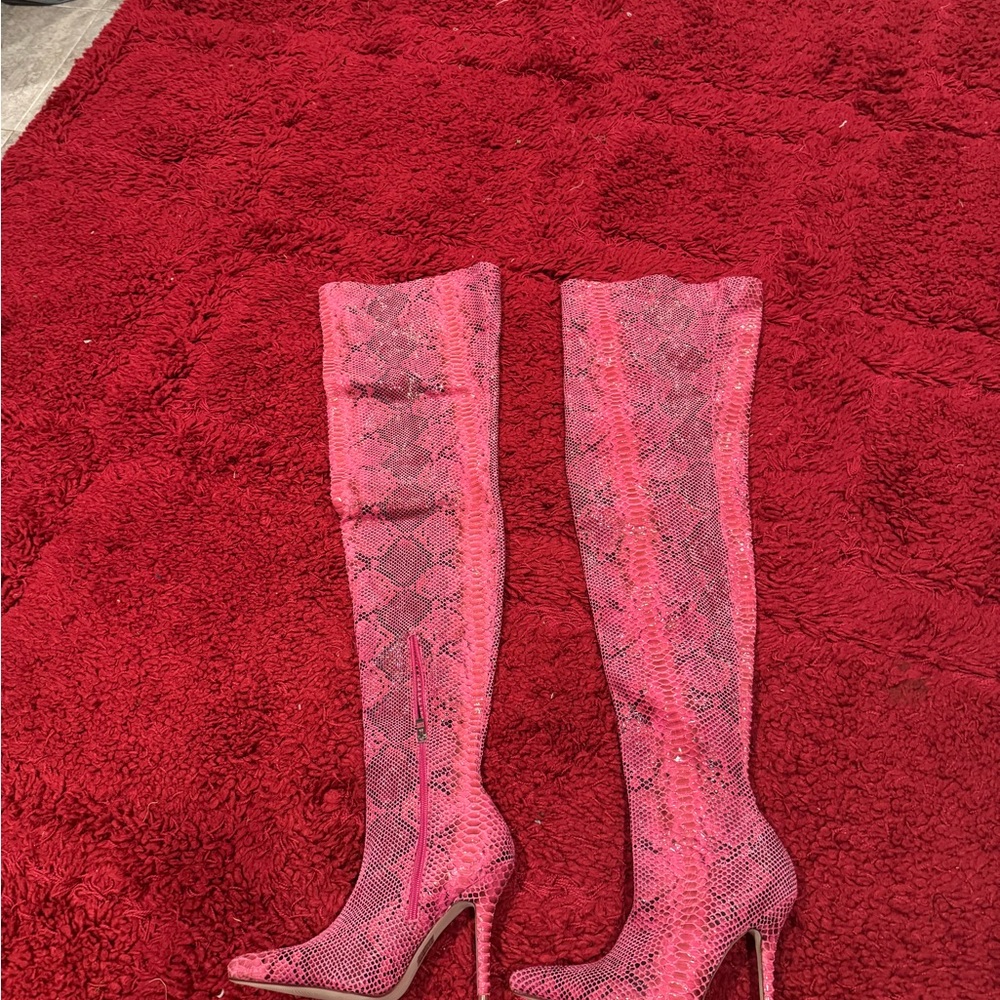 Hot pinkish snakeskin knee high boots